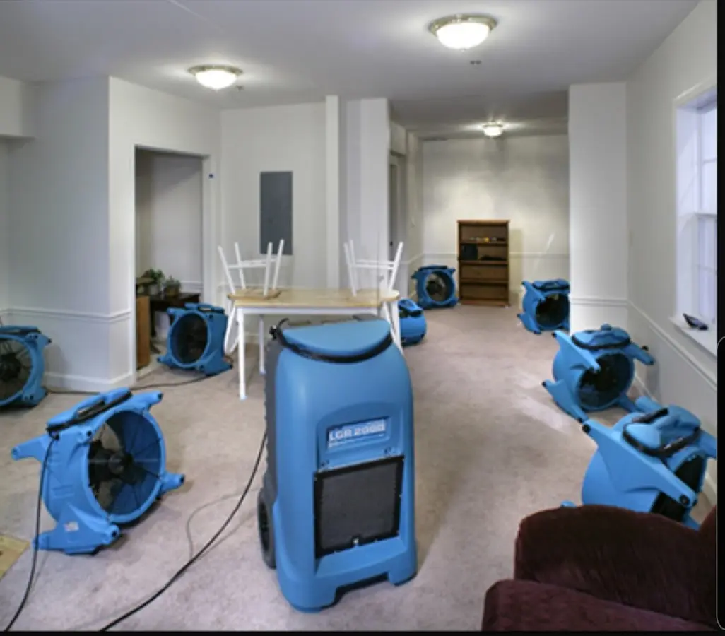 Air movers and dehumidifier setup for Water Damage Restoration in Green River